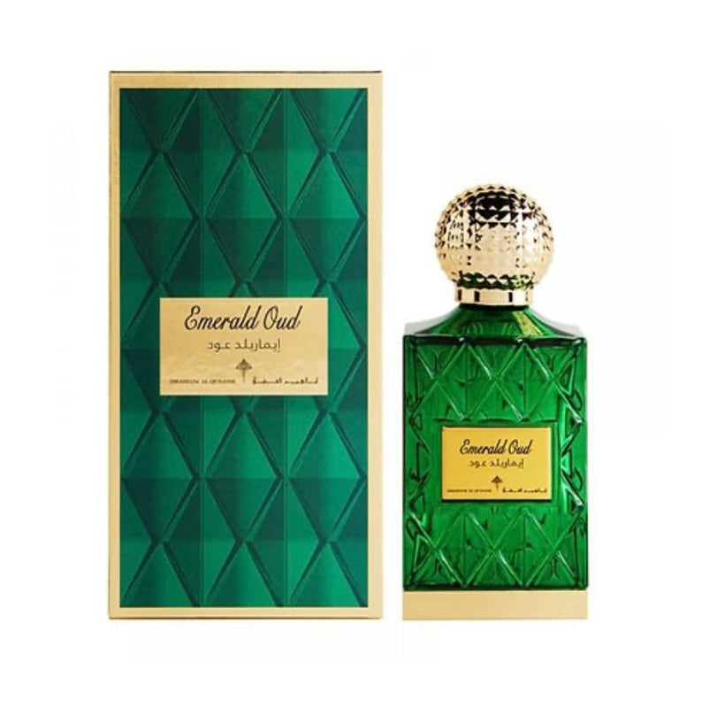 A green perfume bottle and box, showcasing elegance and luxury.