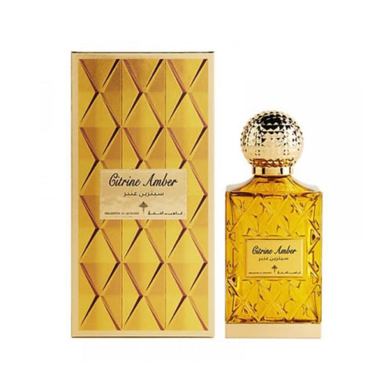 . A luxurious bottle of perfume with elegant gold and black geometric patterns.