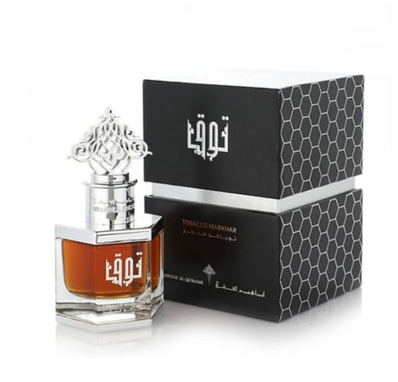 A bottle of perfume with a box on top, elegant and luxurious packaging.