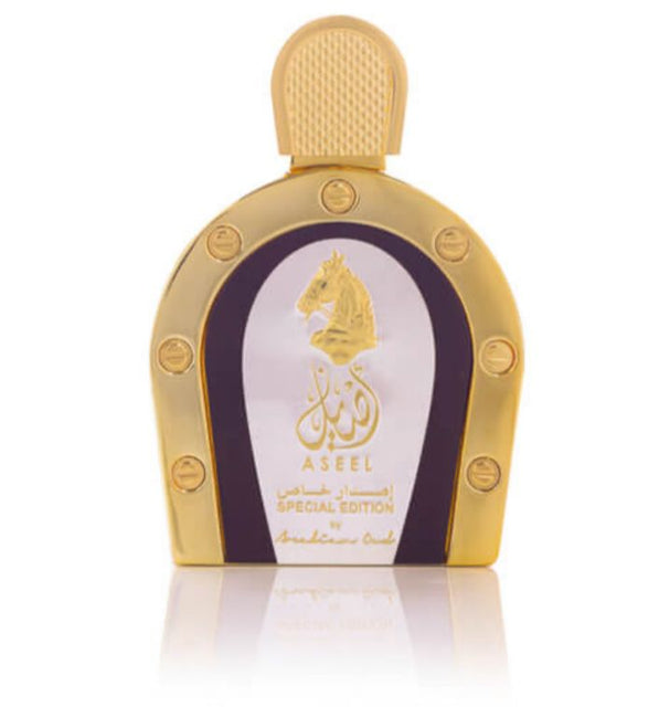 Arabic perfume bottle with gold accents, exuding elegance and luxury.