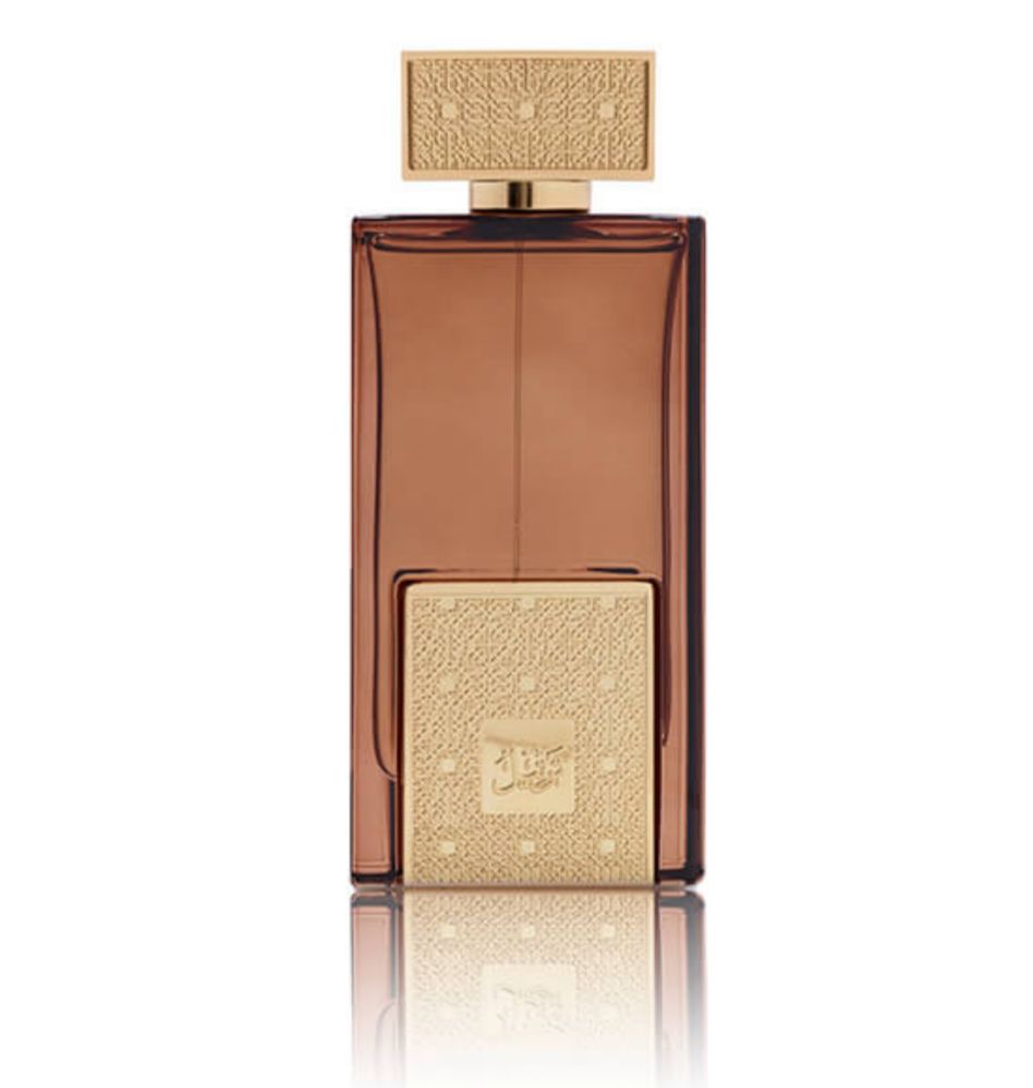 A brown and gold perfume bottle, exuding elegance and luxury.